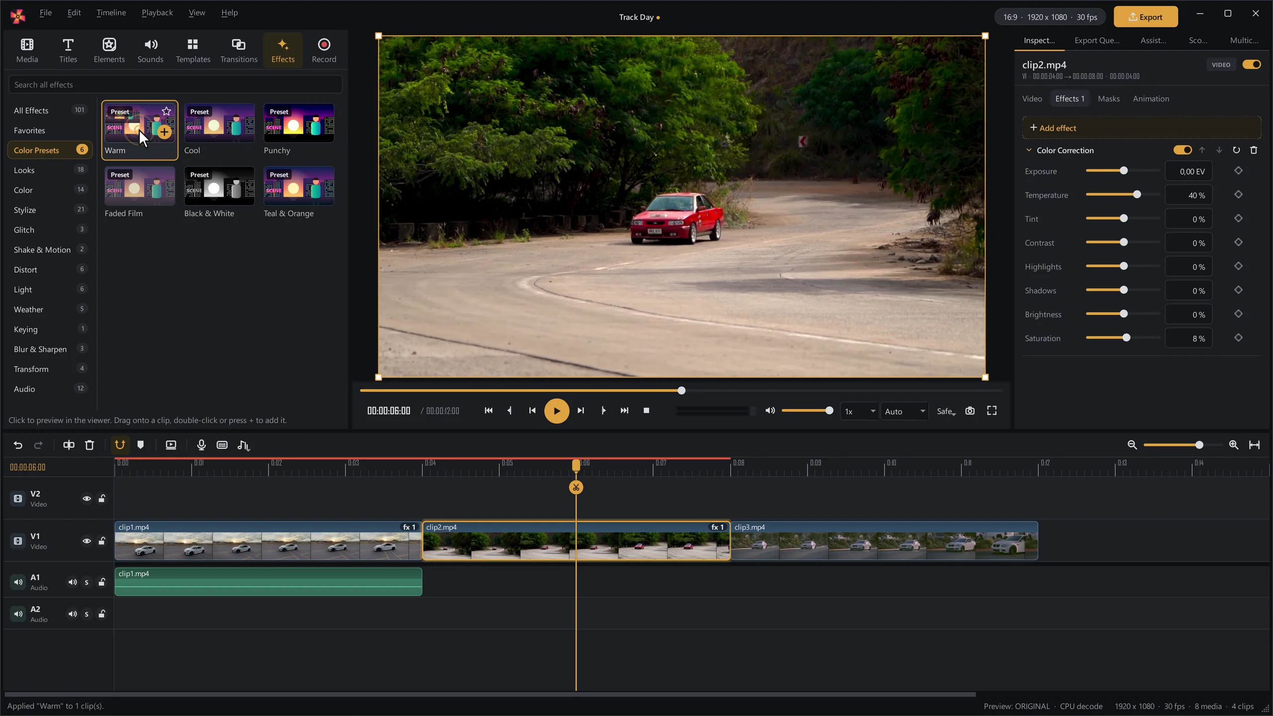 The SceneMill window with the color presets Warm, Cool, Punchy, Faded Film, Black & White and Teal & Orange, a preview of a red car on a forest road, the color correction sliders in the inspector and the timeline below.